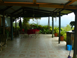 The tiled veranda is great for enjoying the vistas and balmy weather whille protected from the occasional rain.